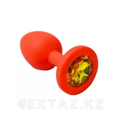 Анальная пробка из красного силикона с жёлтым  кристаллом (размер S) от sex shop Extaz