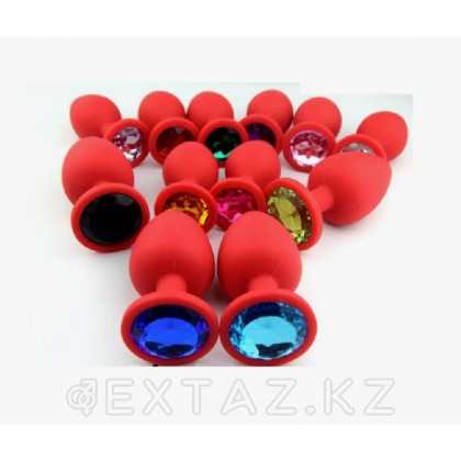Анальная пробка из красного силикона с жёлтым  кристаллом (размер S) от sex shop Extaz фото 2