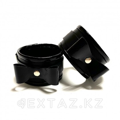 Наручники с бантиками из эко-кожи черные от sex shop Extaz