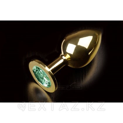 Большая тяжелая  300 г. золотая анальная пробка с закругленным кончиком и кристаллом - 9х3.5 см Зеленый от sex shop Extaz фото 11